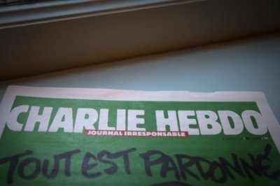 МК ответил карикатурой об изнасиловании главреда Charlie Hebdo