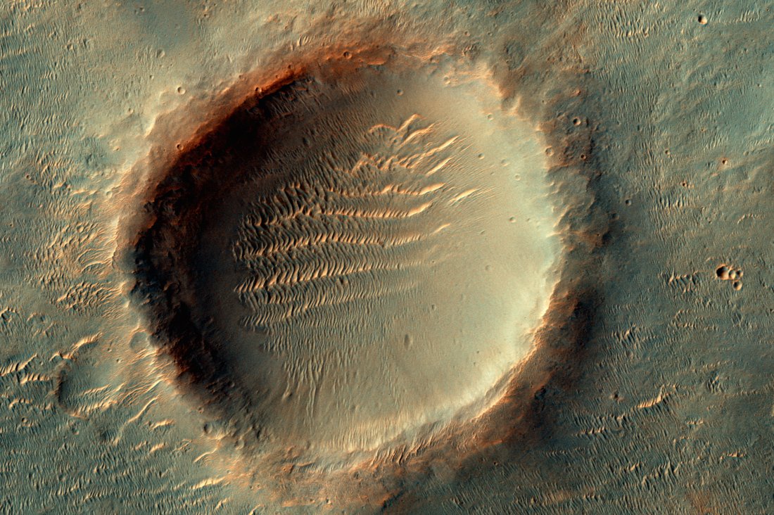 Кратер на Марсе ученые назвали'Реутов