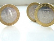 В РФ выпустят монеты с новым символом рубля